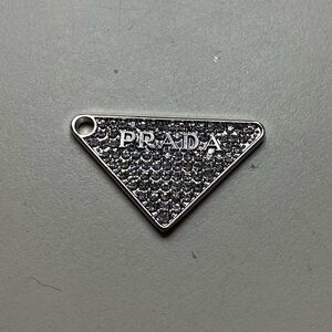 Prada stamped Silver and crystalTriangle Pendant/ charm/ zipper pull